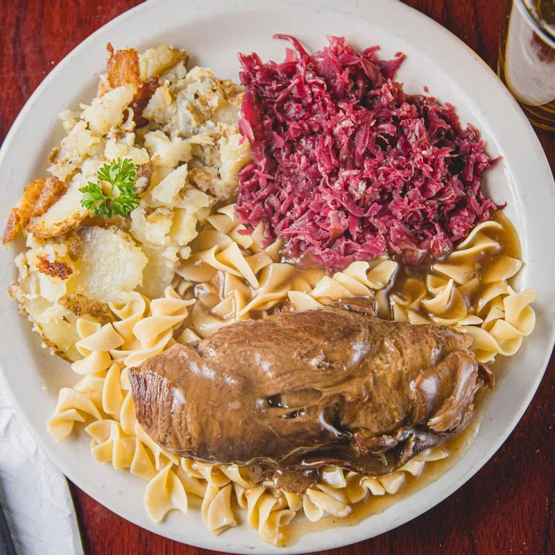Official Wurst Haus German beef roll on noodles